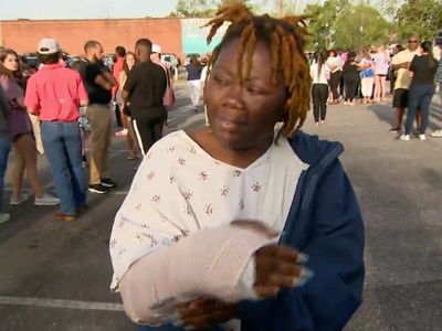 Dadeville shooting victim attends vigil in hospital gown