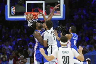 Cam Johnson put Joel Embiid on an absolute poster with a stunning dunk during 76ers-Nets