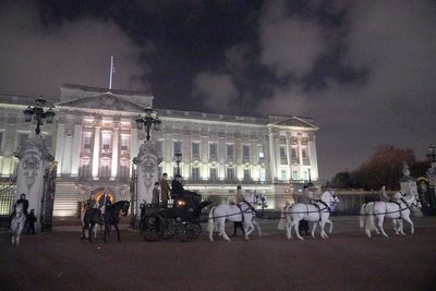 Midnight coronation rehearsal sees military parade through empty London streets