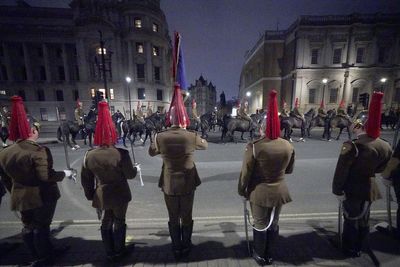 In Pictures: Military march in midnight coronation rehearsal
