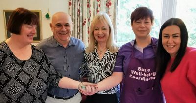 A Crieff residential home and a caring Dunkeld community celebrate being joint winners of creative award