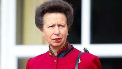 Princess Anne stuns in bold red jacket but it's the intriguing neckline that really caught our eye