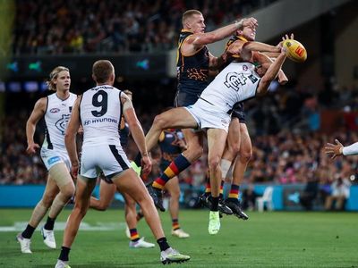 Crows open AFL Gather Round with upset win over Blues