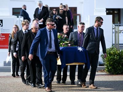 Former treasurer Kerin remembered with state funeral