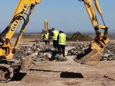 Police searching tonnes of rubbish for woman's body