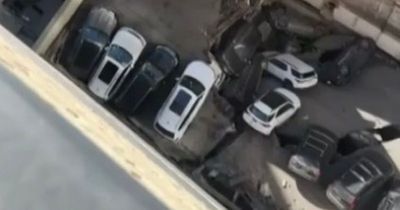 One dead and five injured after New York parking garage collapses on top of cars