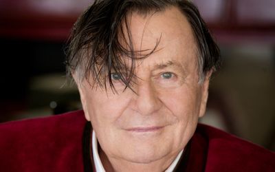 Comedian Barry Humphries in hospital in ‘absolute agony’