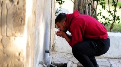 Tunisians Ration Water in State-ordered Ban
