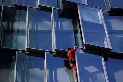 'French Spiderman' climbs Paris skyscraper as protest against pension law