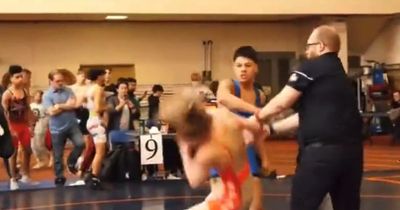 Wrestler sucker punches opponent after loss as police launch probe