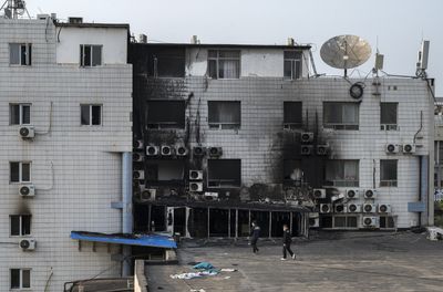 12 are arrested after a Beijing hospital fire killed 29 people