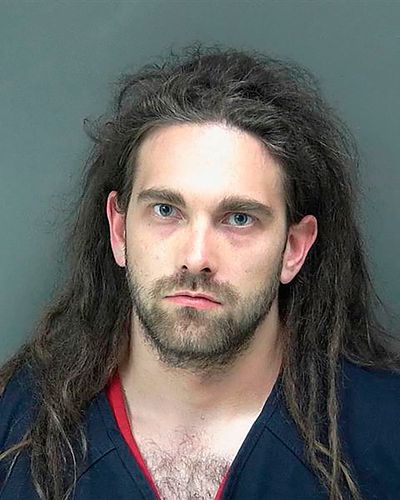 Man pleads guilty to killing 2 outside Indiana factory