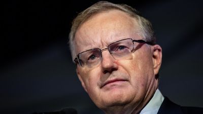 Lowe prepared to stay on as RBA governor after Treasurer releases critical review; ASX finishes flat — as it happened