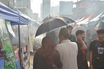 Malaysia’s Ramadan bazaars draw crowds, but some tighten belts