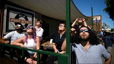 The eclipse in pictures: Thousands captivated by stunning event