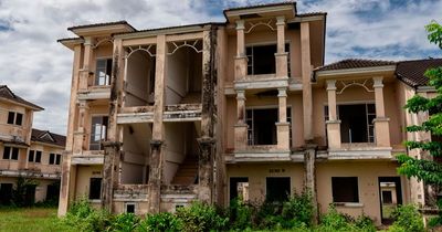 Inside 'village of death' abandoned after murders with 'cloaked figures' seen