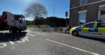 Road closed as man taken to hospital after motorbike crash