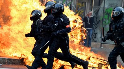 French police watchdog calls for action against officers who beat protesters