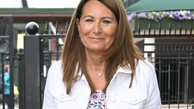 Carole Middleton's floral jumpsuit and white jacket combo is the spring style inspiration we needed