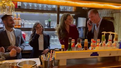 William takes restaurant reservation for unsuspecting customer and Kate tries darts during visit to Birmingham