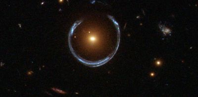 New look at 'Einstein rings' around distant galaxies just got us closer to solving the dark matter debate