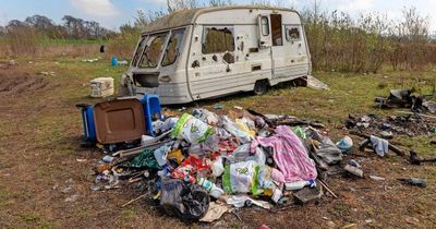 Angry locals rage as abandoned toilets and wrecked caravan among heaps of rubbish at Scots park