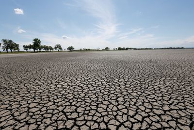 Activists mark Earth Day as scientists warn of more extreme weather