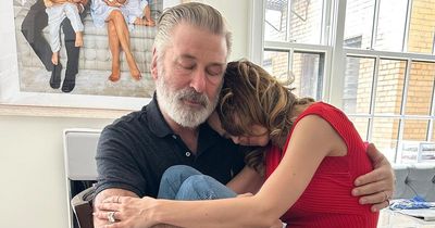Tired Alec Baldwin holds wife as she shares emotional tribute after Rust charges dropped