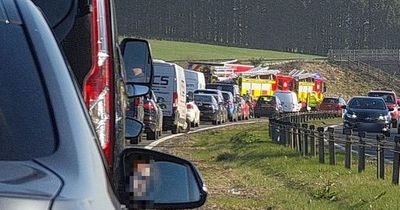 Horror crash on M77 leaves two people in hospital as fire crews called to scene
