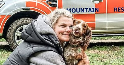 Emotional moment dog reunited with owner after falling more than 100ft over cliff edge