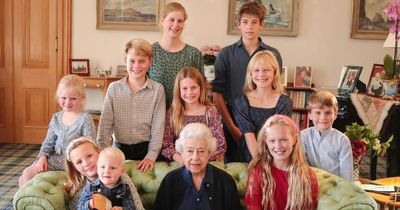 Hidden details in late Queen's family snap - missing great-grandchild and novelty rug