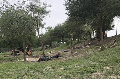 Mexico migrant camp tents have been torched across the border from Texas
