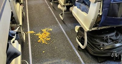 Flight delayed after attendant refused to let plane take off until passengers cleaned up mess in the aisle