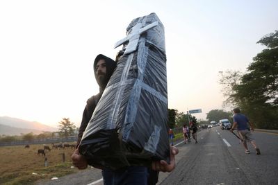 New migrant caravan heads for Mexico City to speed up legal route to US