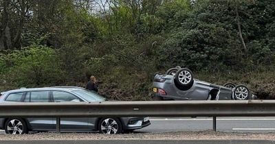 Video footage captures horror moment car flips onto roof on busy Scots motorway