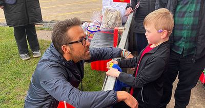 Incredible moment Ryan Reynolds seeks out poorly Wrexham fan, 9, before promotion clash