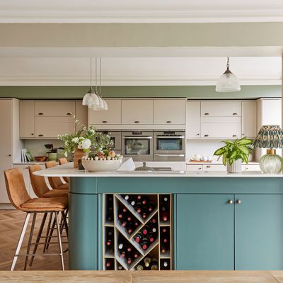 A budget-savvy upcycling trick transformed this dated kitchen into a luxury space