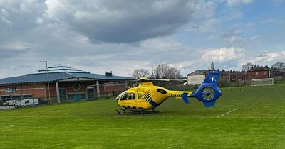 Air ambulance lands as police cordon off street amid reports of person seriously injured