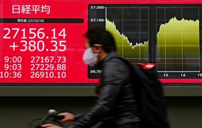 Asian stocks mixed ahead of tech earnings results