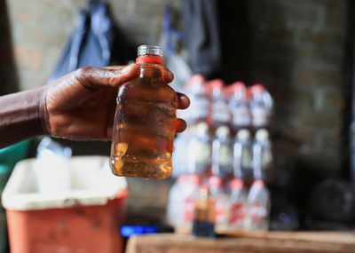 Zimbabwe clamps down on 'backyard brewers' as fake booze booms