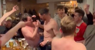 Wrexham superfan Bootlegger parties with topless players as brilliant pub celebration footage emerges