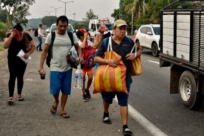 Migrants walking through Mexico threaten road blockades