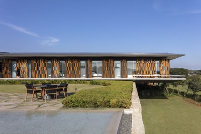 MJE House is a rural Brazilian retreat defined by its striking cantilever