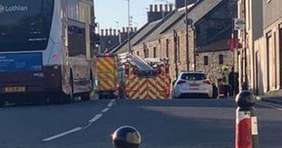 Fire tears through Edinburgh home as hero crews race to the scene