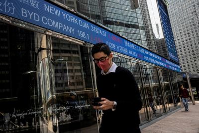 Hong Kong shares drop sharply on major losses in Chinese firms