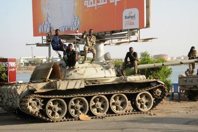 Sporadic gunfire dents Sudan ceasefire as evacuations intensify