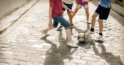 Police slammed for 'ridiculous' letter threatening kids who play football in street