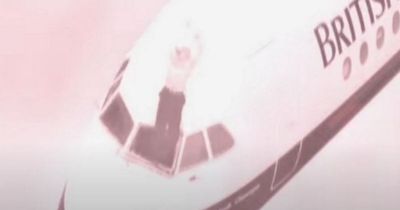 Pilot sucked out of cockpit window as cabin crew hang onto him by the ankles