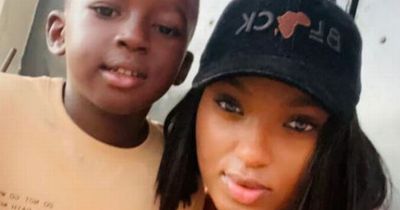 Air hostess and her son, 9, found in shallow grave with 71 other bodies