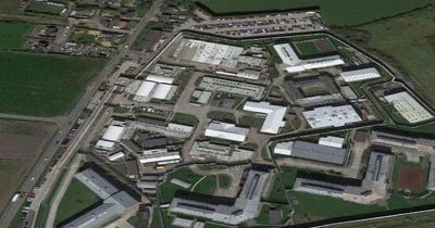Three men arrested after police walk up to car parked in layby near prison
